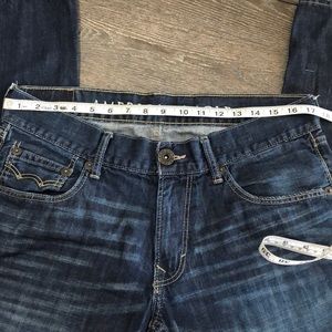 Men’s Am. Eagle  jeans size 33/32 low rise boot
